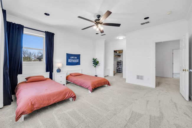 Bedroom #4 has gorgeous windows and a trayed ceiling, and and en-suite bathroom! | Image 24