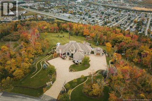 92 De La Falaise Rue, House with 5 bedrooms, 7 bathrooms and null parking in Edmundston NB | Card Image