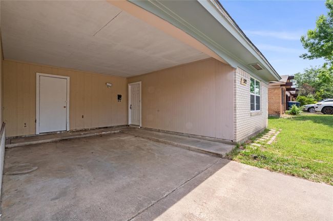 Doorway to property with a yard | Image 5