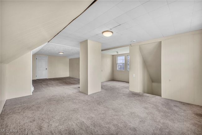 Basement with carpet floors | Image 41