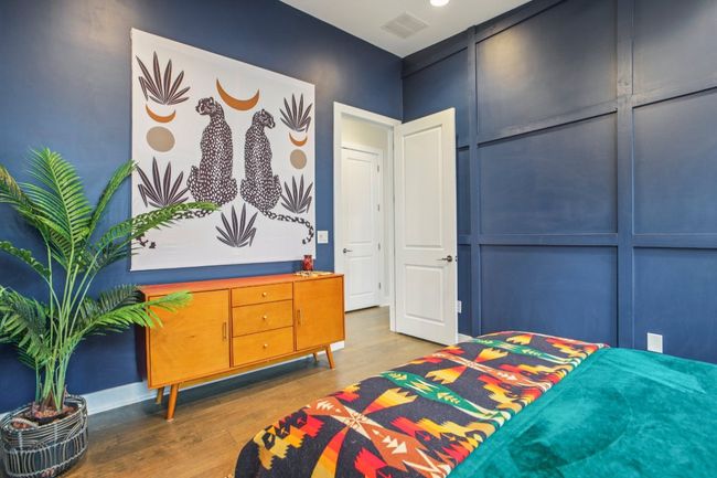 Bedroom featuring wood finished floors | Image 29