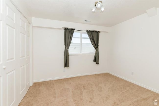 Empty room featuring carpet flooring | Image 52