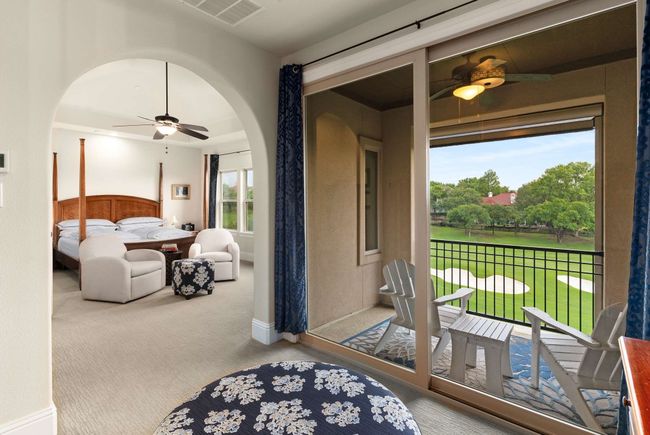 View from Primary Bedroom flex space to patio and overlooking bedroom. | Image 18