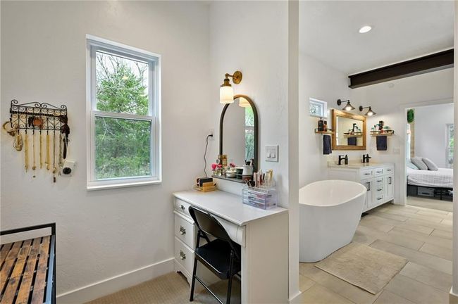 Ensuite bathroom with natural light, a freestanding bath, double quartz vanity | Image 30