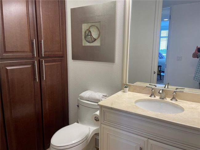Second en-suite bathroom with spacious wall of cabinets | Image 31