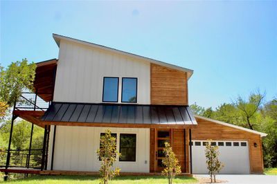 Contemporary home with a garage | Image 2