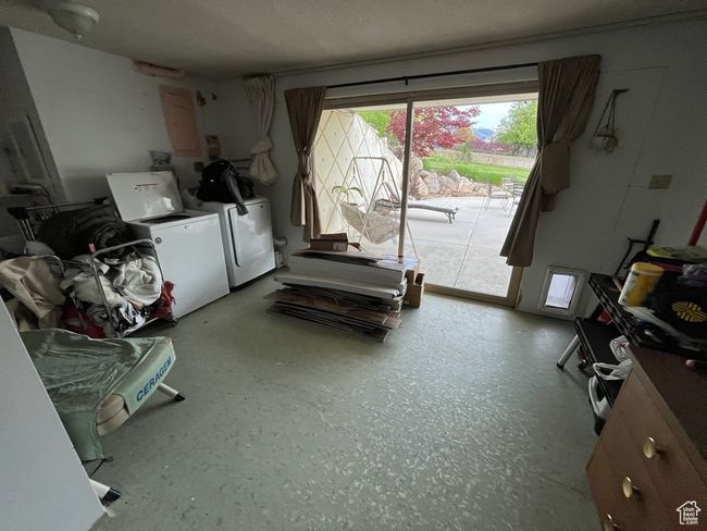 Misc room featuring washing machine and clothes dryer | Image 27