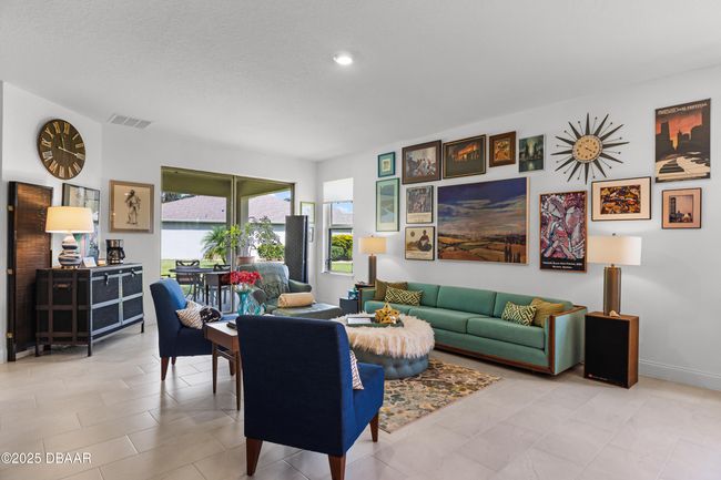 Spacious and Bright Living Room with Sliders to the Covered Porch | Image 13