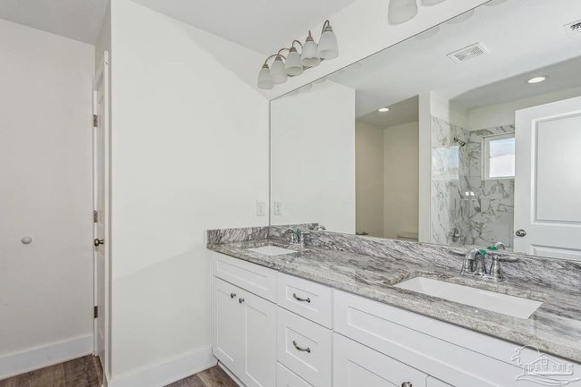 8512 Esplanade St, House other with 4 bedrooms, 2 bathrooms and 2 parking in Navarre FL | Image 7