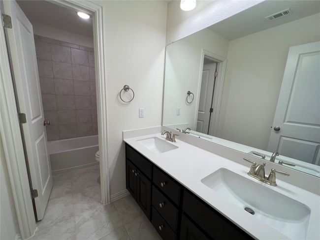 Upstairs Guest Bathroom #3 with dual vanities | Image 28
