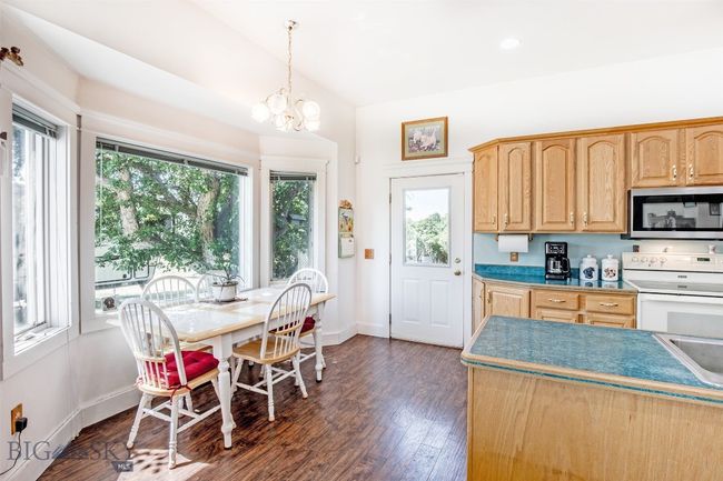 dining area off of open kitchen | Image 9