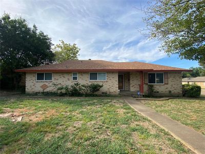 Single story home with a front lawn | Image 1