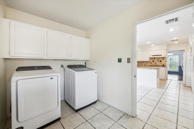 Large laundry room off the kitchen and back entrance | Image 17