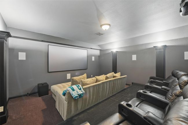Home theatre with upgraded lighting and surround sound for all your favorite sports and movie viewings! | Image 26