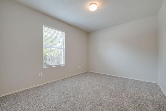 Unfurnished room with carpet flooring and baseboards | Image 6