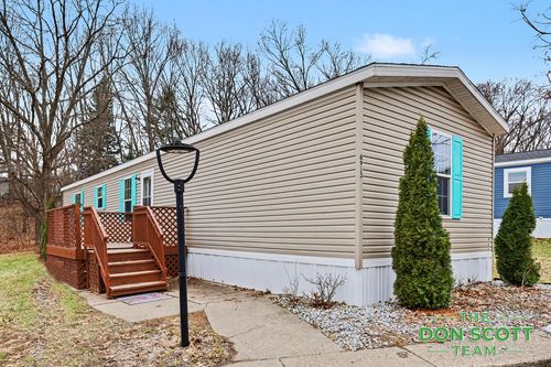 6913 Sandwood Dr Ne, Rockford, MI, 49341-9202 | Card Image