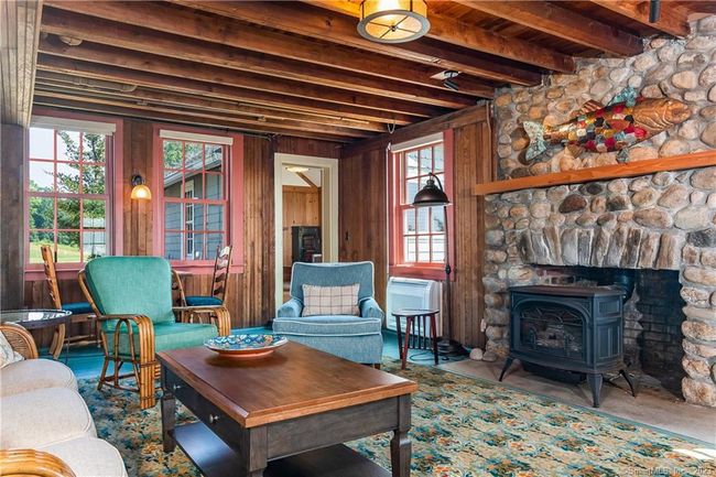 Living room, looking toward the den. | Image 6