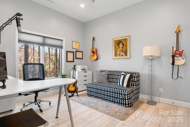 Guest Bedroom with private spa bathroom located within the area of the 2nd primary bedroom and kitchen space. Perfect for long term guests, office space, and many other uses. | Image 20