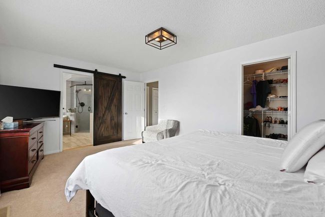 716 Boulder Creek Drive Se, House other with 4 bedrooms, 4 bathrooms and 4 parking in Langdon AB | Image 21