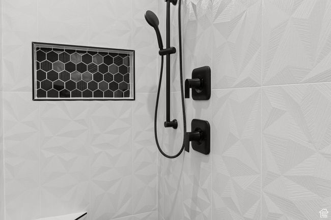 Room details with tiled shower | Image 24