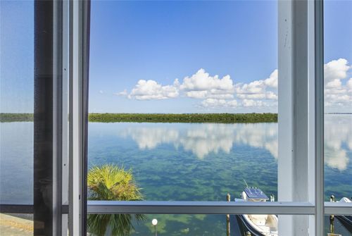 303-4420 Exeter Dr, LONGBOAT KEY, FL, 34228-2222 | Card Image