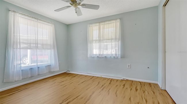 Guest bedroom with 2 updated windows. | Image 15