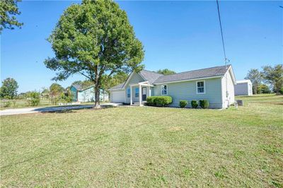 11610 Highway 142, House other with 5 bedrooms, 3 bathrooms and 5 parking in Covington GA | Image 2