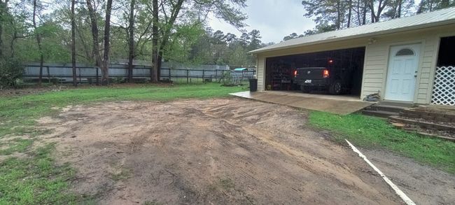 View of yard featuring a detached garage | Image 10