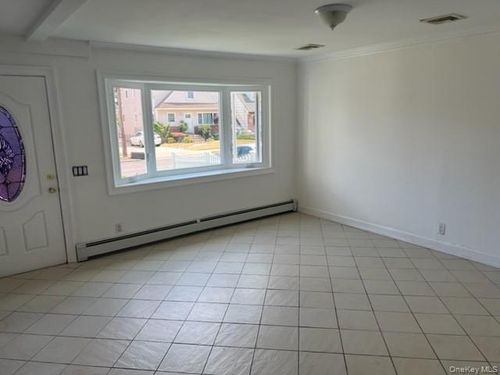 94 Lucille Ave, Elmont, NY, 11003-2722 | Card Image