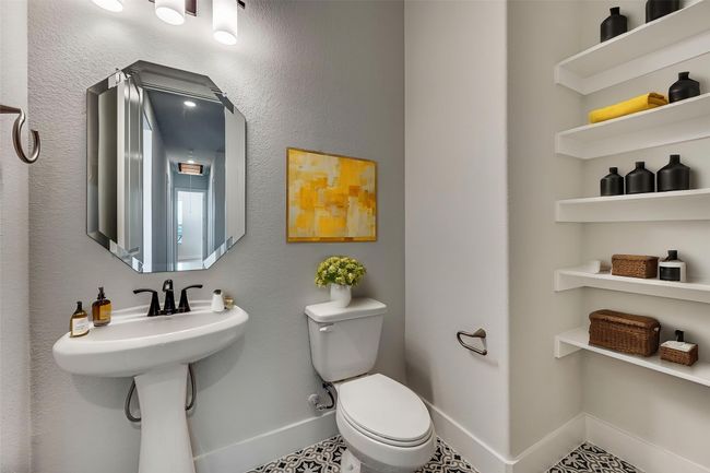 Half bath featuring baseboards and toilet | Image 19