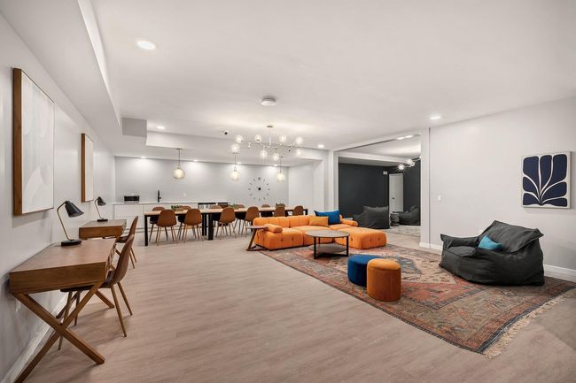 Living area with recessed lighting, light wood-style flooring, and baseboards | Image 13