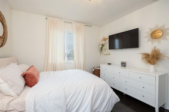 Bedroom featuring dark wood-style flooring | Image 32