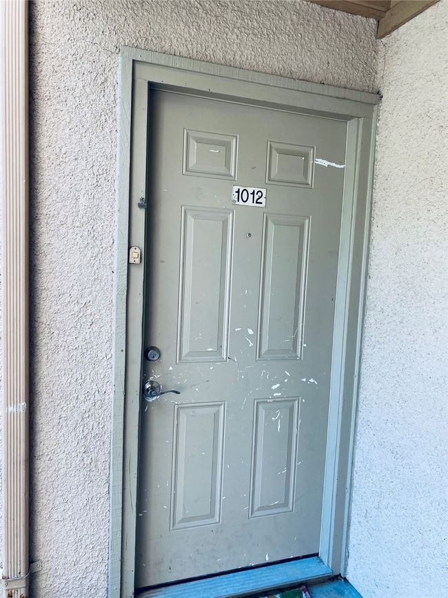 Property entrance featuring stucco siding | Image 11