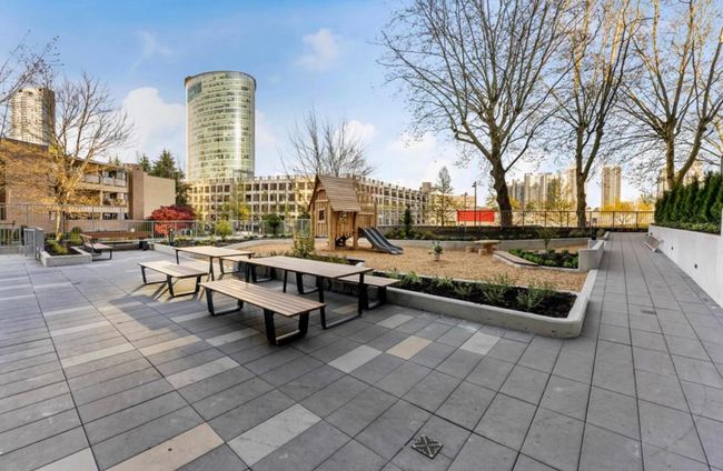 View of property's community featuring a patio, playground community, and fence | Image 20