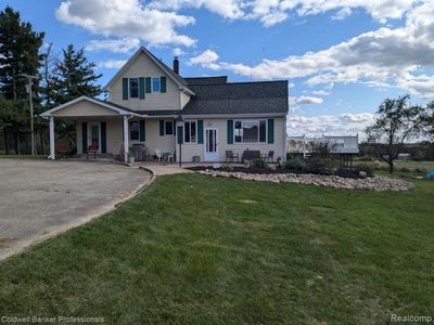 4575 Van Dyke Road, Home with 4 bedrooms, 2 bathrooms and null parking in Burnside Twp MI | Image 1