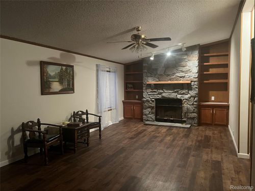 222 Chestnut St Ne, Kalkaska, MI, 49646-8206 | Card Image