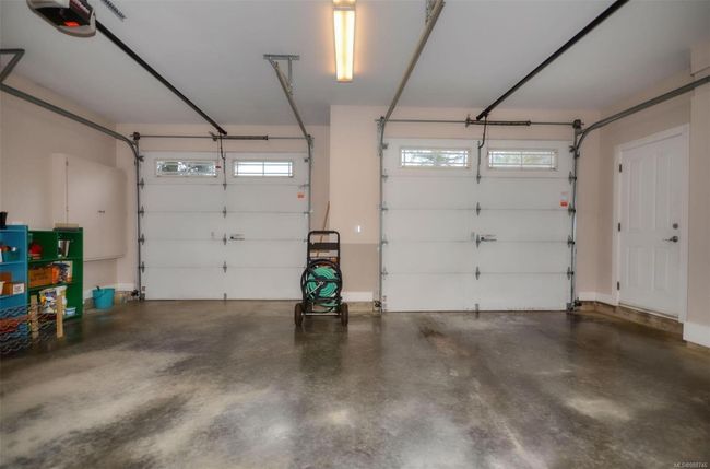 Double garage with electrical service and storage | Image 30