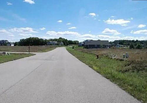 669 Madeira Dr, Traverse City, MI, 49696-9375 | Card Image