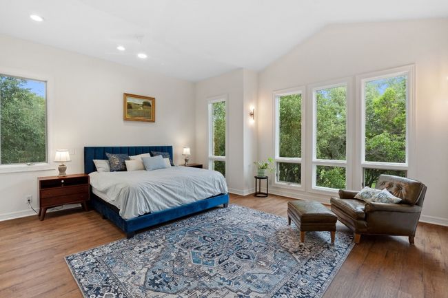 Plenty of natural light in the main-level primary bedroom. | Image 5
