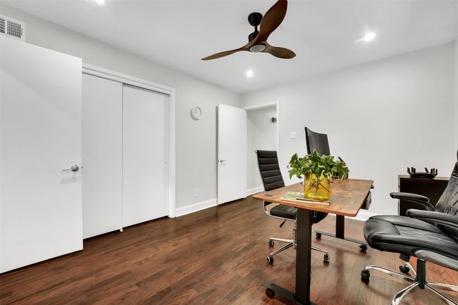 Home office featuring ceiling fan, recessed lighting, and wood finished floors | Image 19