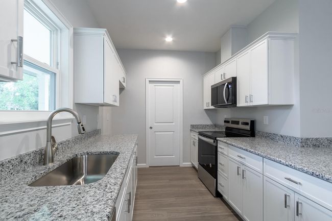 7544 Se 78 Th Pl, House other with 3 bedrooms, 2 bathrooms and null parking in TRENTON FL | Image 12