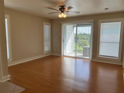 LIVINGROOM WITH ENTRY TO BALCONY | Image 3