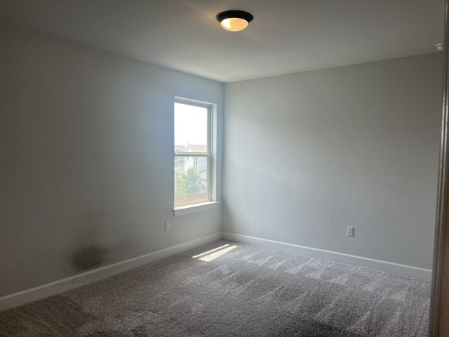 Carpeted empty room with baseboards | Image 27