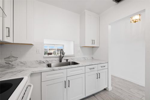 309-5031 W Oakland Park Blvd, Lauderdale Lakes, FL, 33313-1597 | Card Image