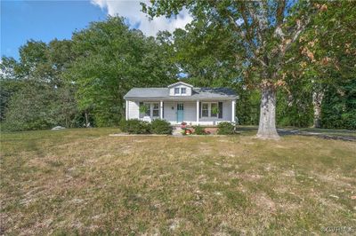 View of front of house featuring a front lawn and a porch | Image 3