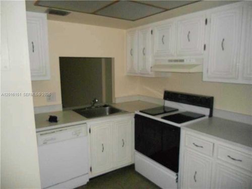 1e-119 Royal Park Dr, Oakland Park, FL, 33309-5884 | Card Image