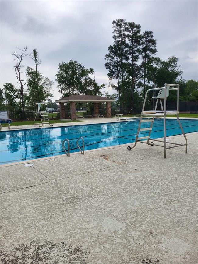 Kleinwood residents enjoy a pool, tennis courts, playground and clubhouse all for a low HOA fee of $300 (2025). | Image 35