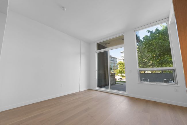 Unfurnished room featuring light wood-style flooring and baseboards | Image 10