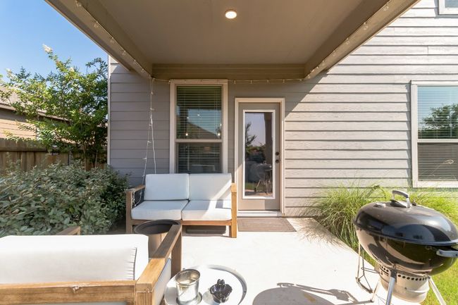 View of patio featuring grilling area | Image 29