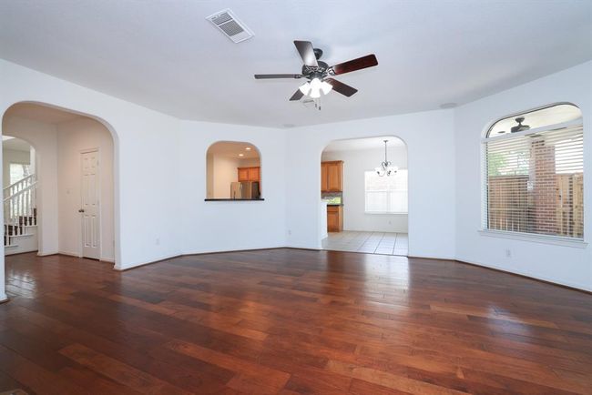 New fan with light kit and blinds for privacy. Doorway is going to the powder bath. | Image 13